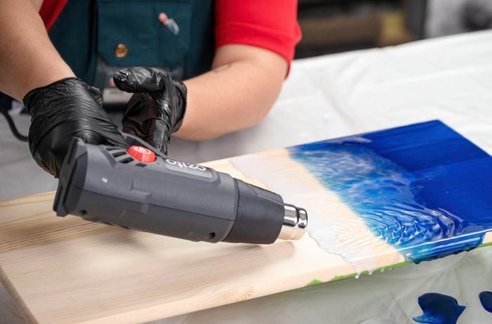 Creating waves using a heat gun.