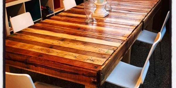 A dining table made from recycled timber