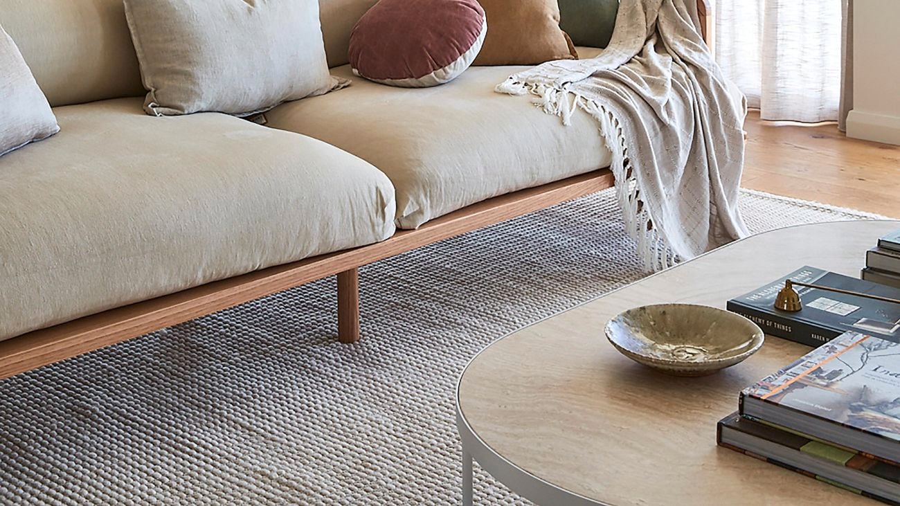 Light-filled living room with a neutral colour palette]