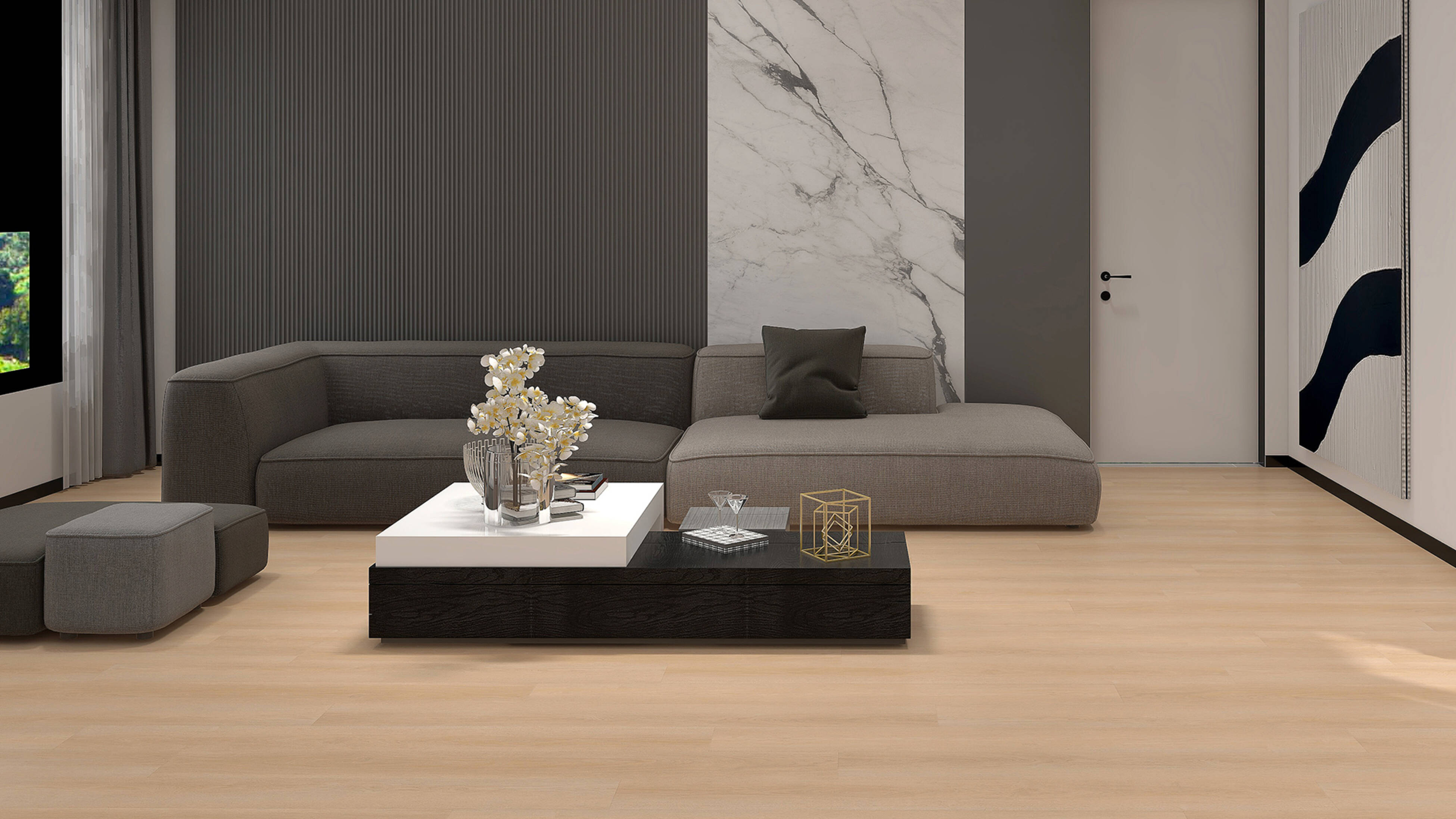 A modern living room with a grey modular sofa, a two-tiered coffee table with white flowers and decor, and a wall featuring grey ribbed and white marble-effect panels.