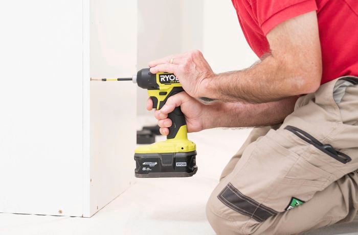 Attach the bottom panel using cordless drill