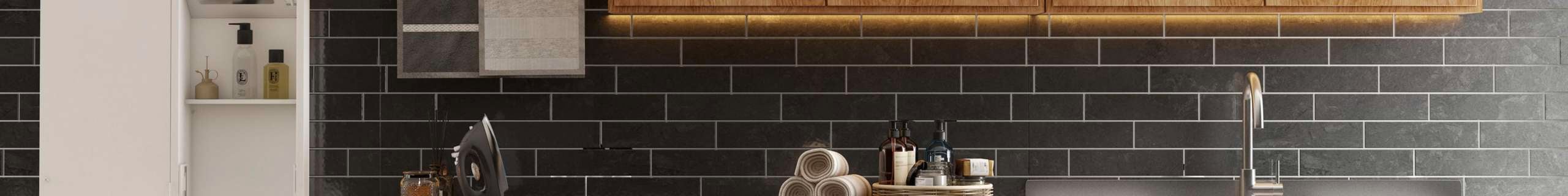 Dark laundry with a wall mounted ironing board, supertub, washing machine, storage, timber look cabinets and black subway wall tiles
