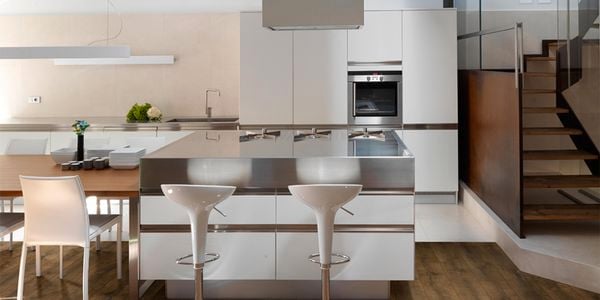 Modern kitchen interior with kitchen island, range hood