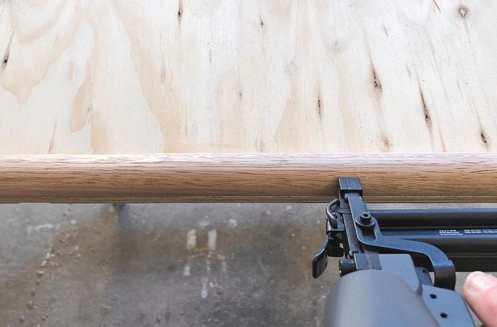 Fixing dowel onto plywood using a nail gun