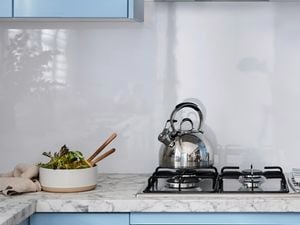 Marble splashback in kitchen.