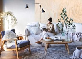 woman reading on a couch