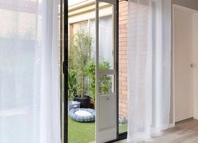 A portable doggy door in situ