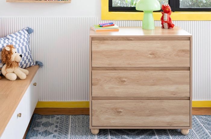 Kids’ room featuring bold yellow Kid-core window trim