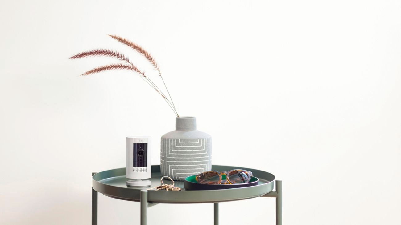 Ring Stick Up Cam on a green side table
