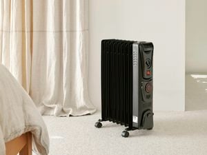 Indoor standing heater inside a bedroom