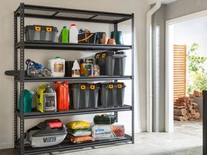 Boxes and equipment on garage storage shelving 