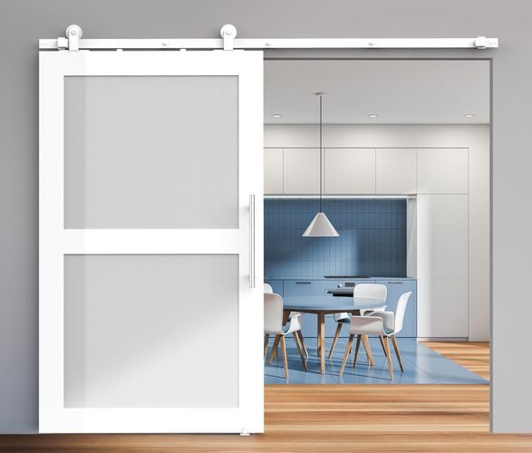 Kitchen and dining interior featuring Rolltrak Matte White Top Mount Barn Door Track, 400mm Stainless Steel Round Single Pull Handle and Matte White Barn Door Guide.