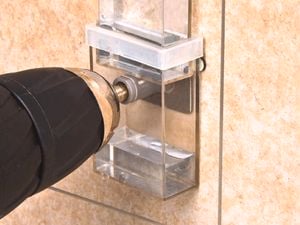 Drilling into a tile.
