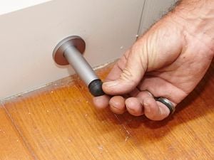 DIY Step Image - How to install a door stop . Blob storage upload.