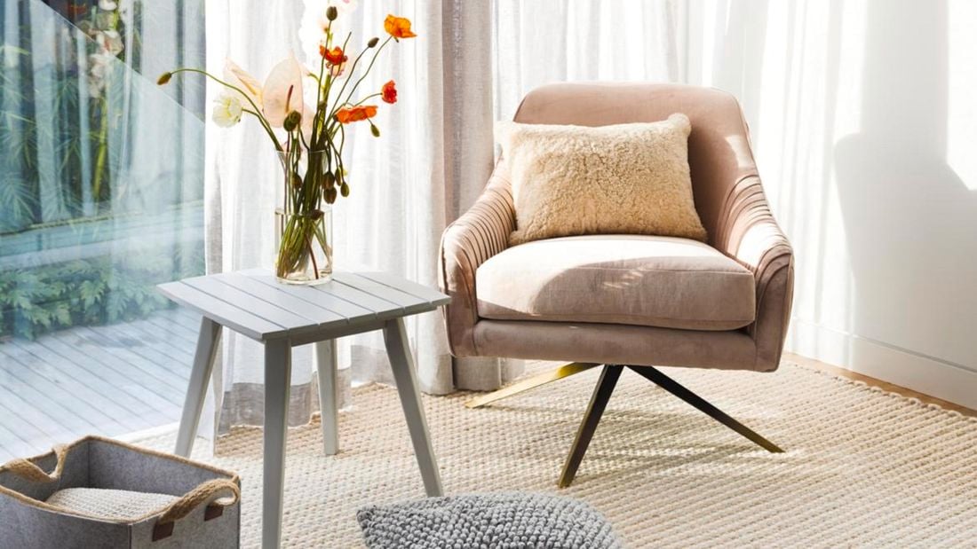 Chair, curtains and rug.