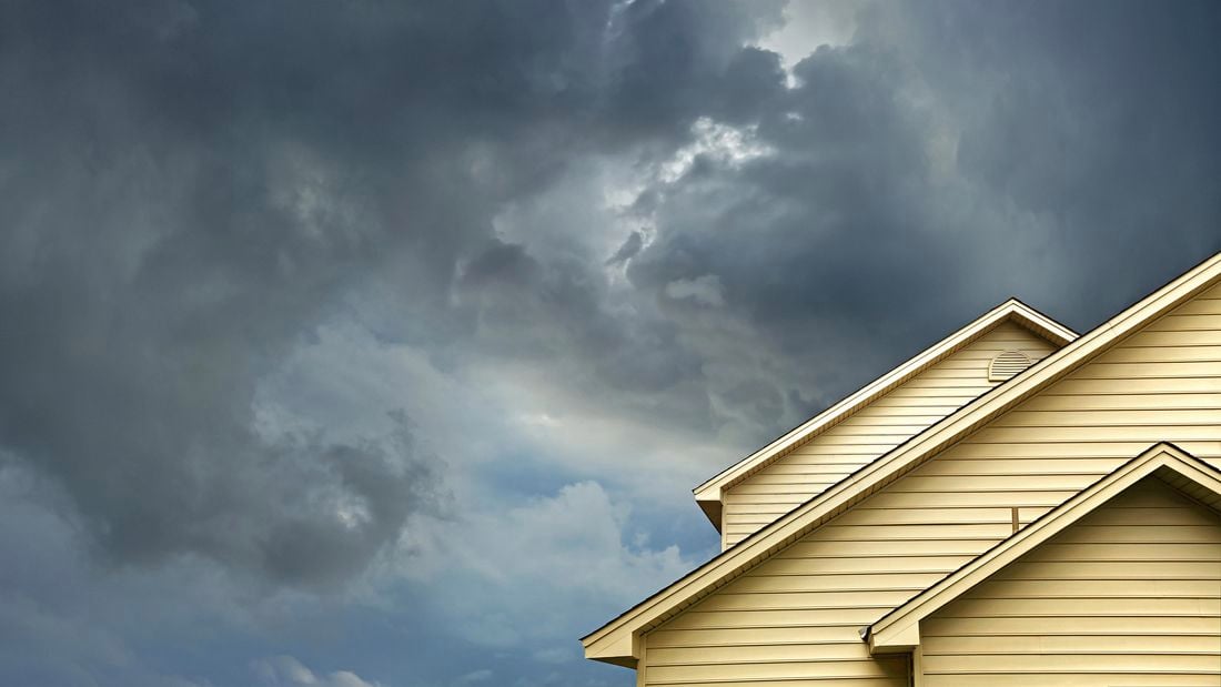 Image of roof with storm brewing 