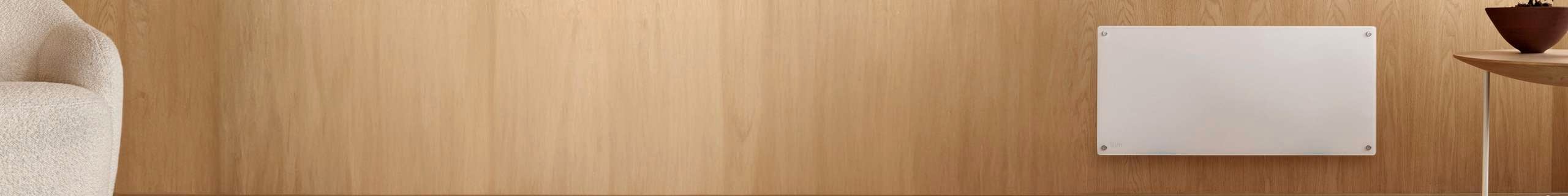 Panel heater mounted on a timber look wall.