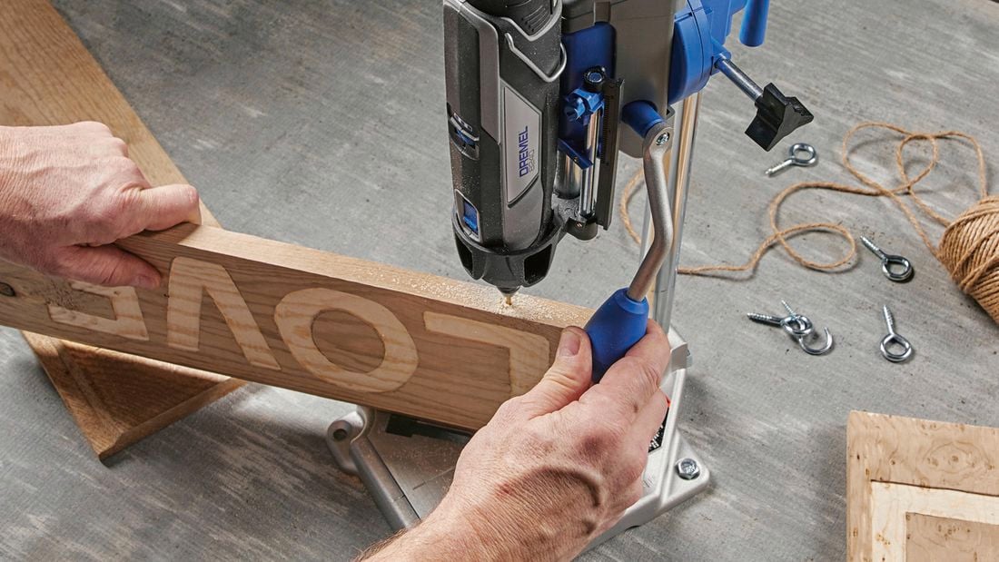 Rotary tool drilling into wood.