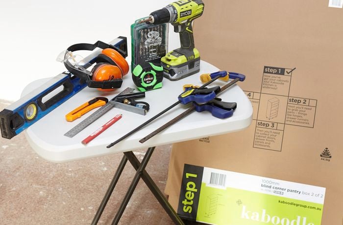 Tools and materials required for project including clamps, drill, tape measure and level