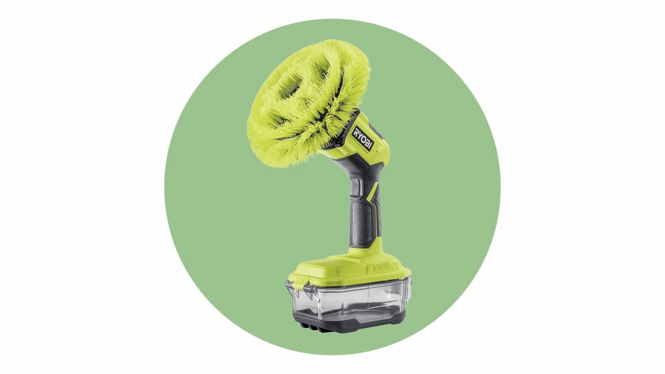 A close-up product shot on a green background of a Ryobi power scrubber used for spring cleanin