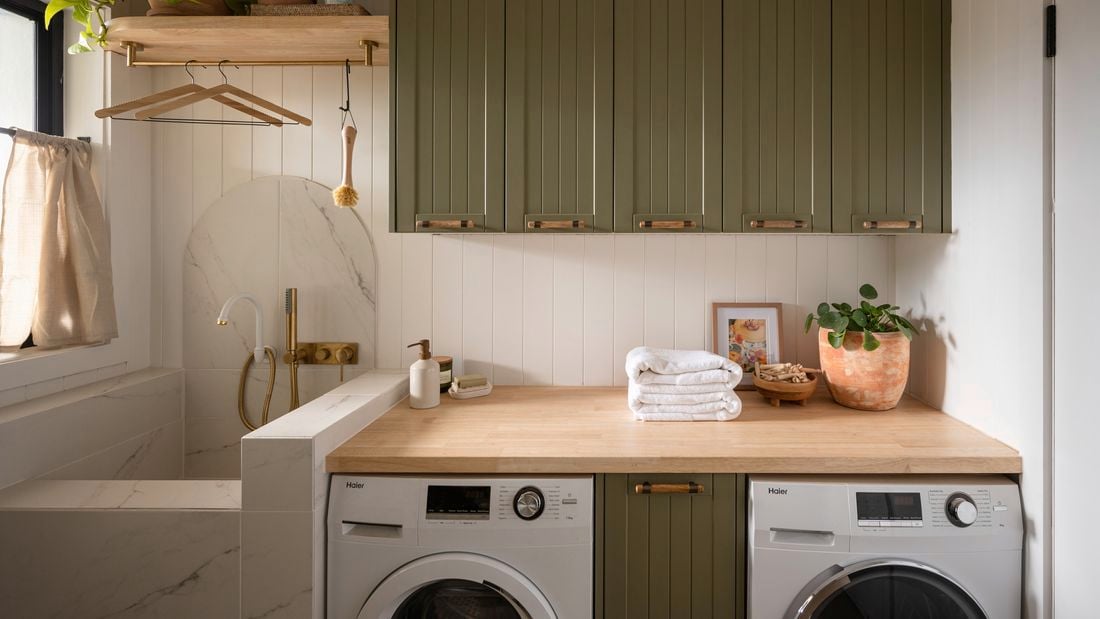 Laundry cabinetry with a pet bathing area