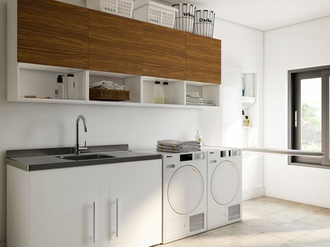 Modern laundry with a wall mounted ironing board, supertub, washing machines, storage and open shelves