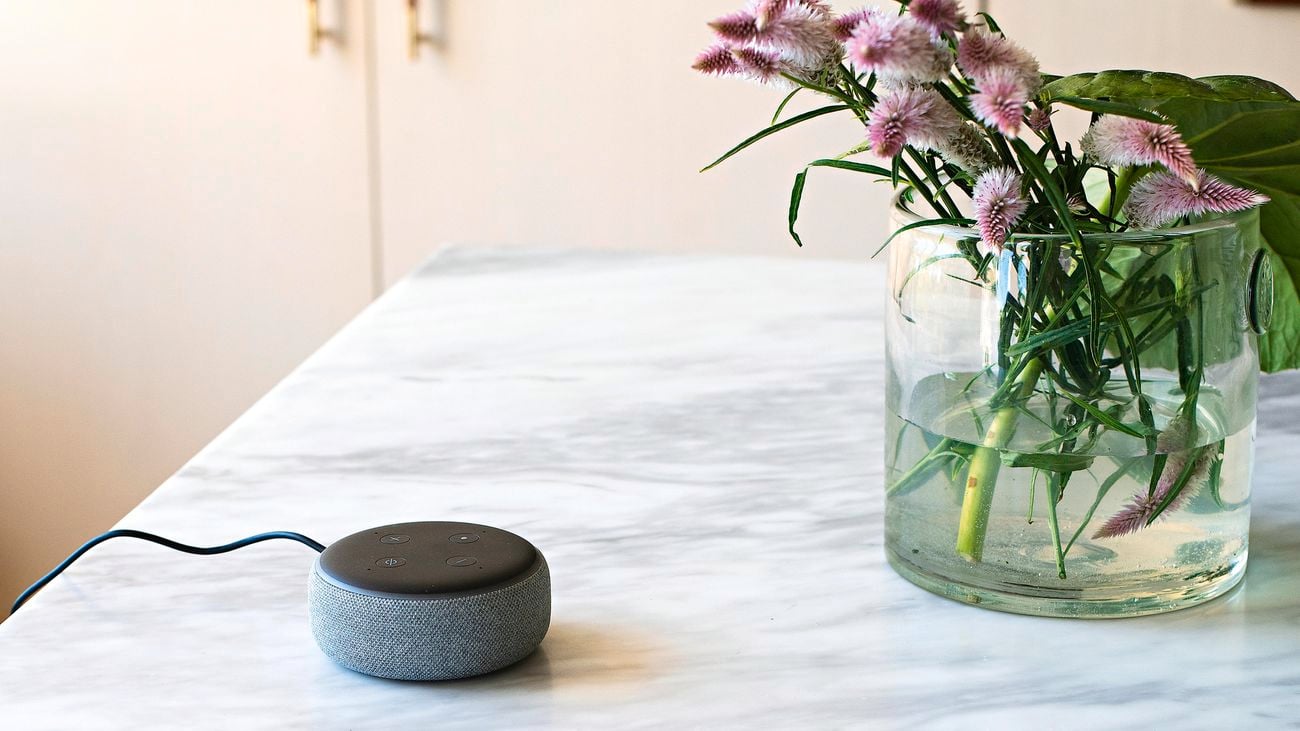 Amazon Echo ‘Grey Dot’ smart speaker on a marble kitchen island