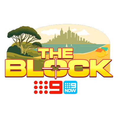 The block in yellow writing with a tree, buildings, sand, water and grass in the background.