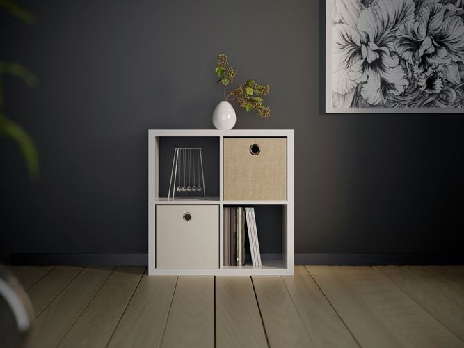 Cube shelving unit on wooden flooring with a picture on the wall