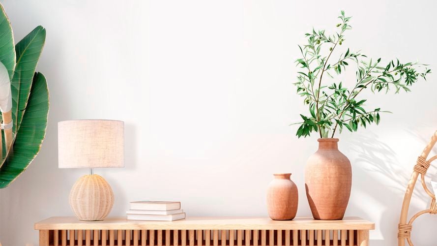 white table lamp on side table