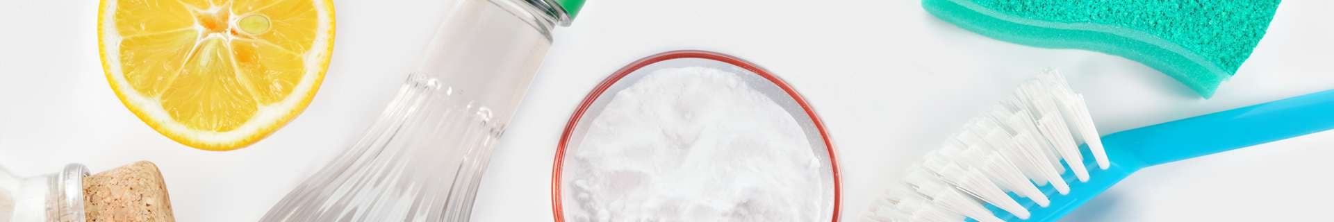 Image of Glitz Green cleaning products and a lemon.