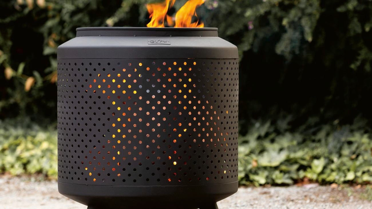 Black, Acheron fire pit in a backyard