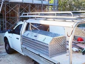 Home building site with ute in driveway