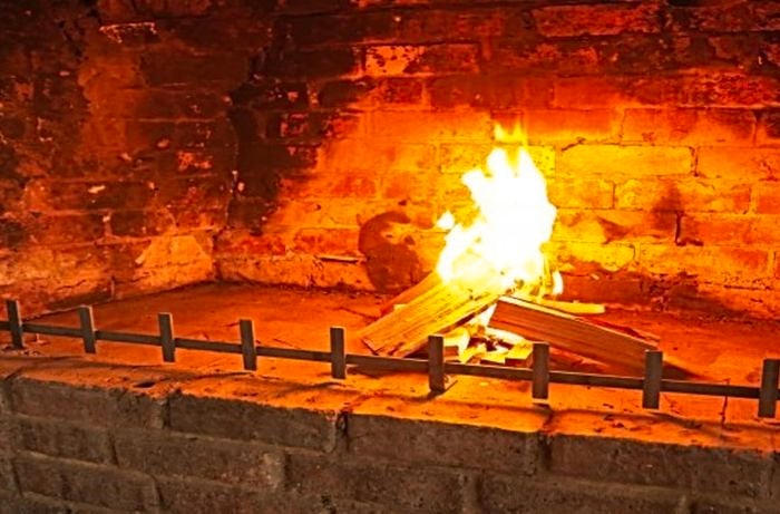 Fire burning in fireplace.