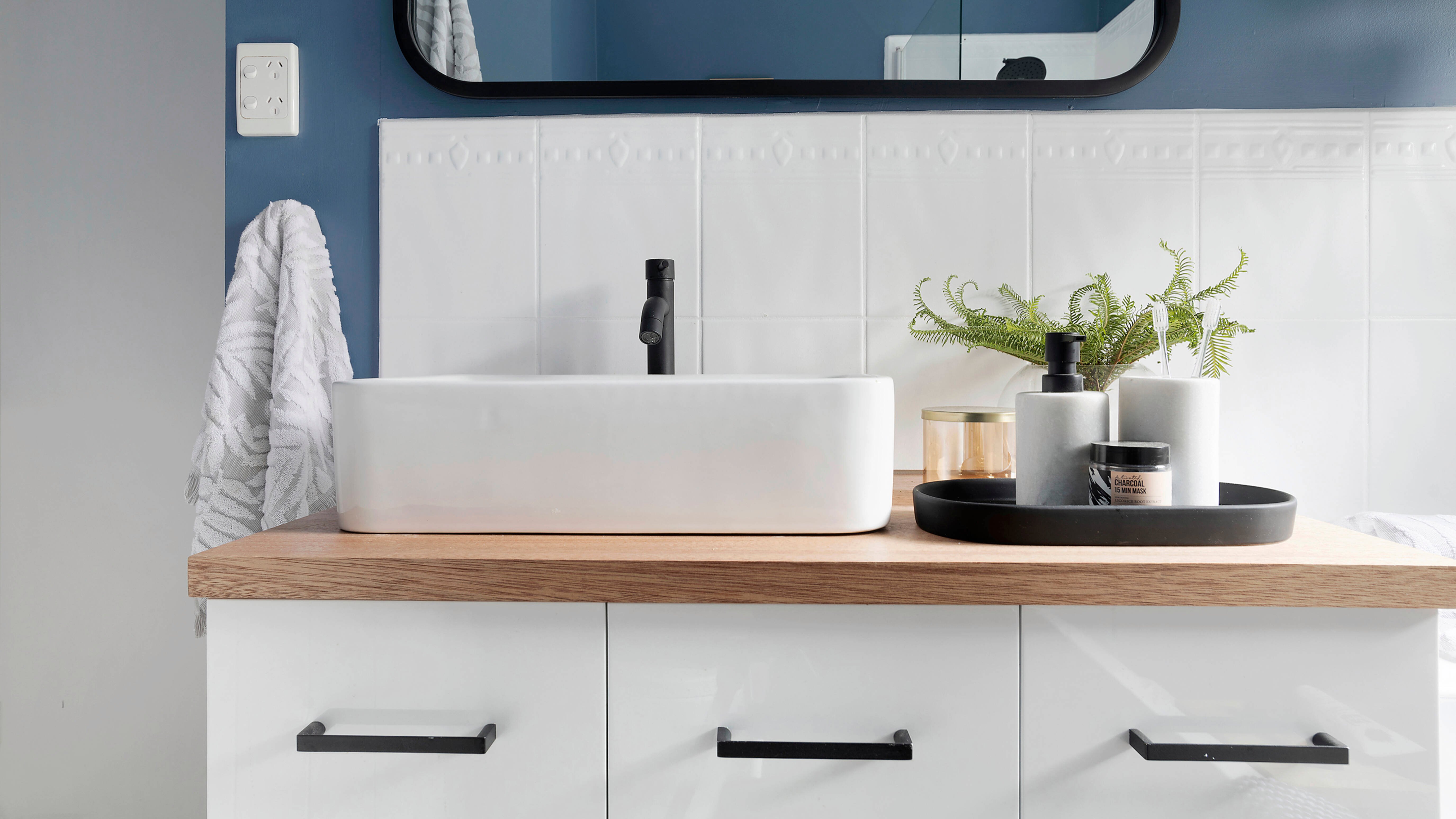 Bathroom with blue and white accents 
