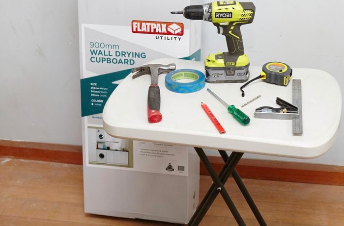 Tools and materials needed to assemble a wall drying cupboard
