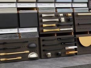 Kitchen door handles displayed in warehouse