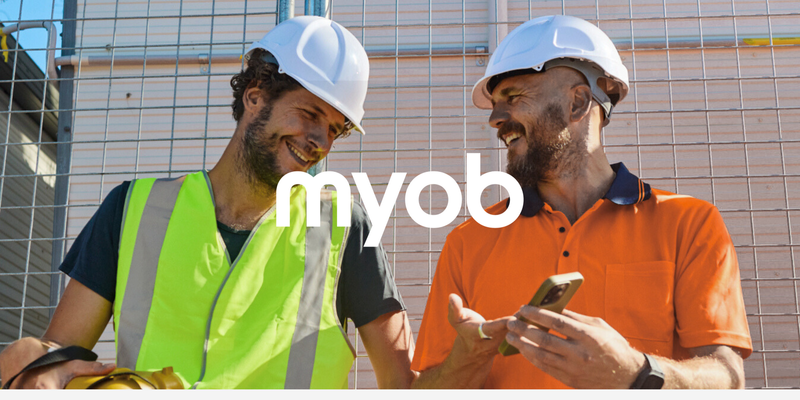 Two worked wearing white hardhats promoting MYOB