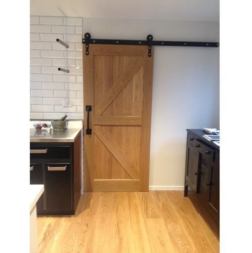 Wooden door on sliding rail