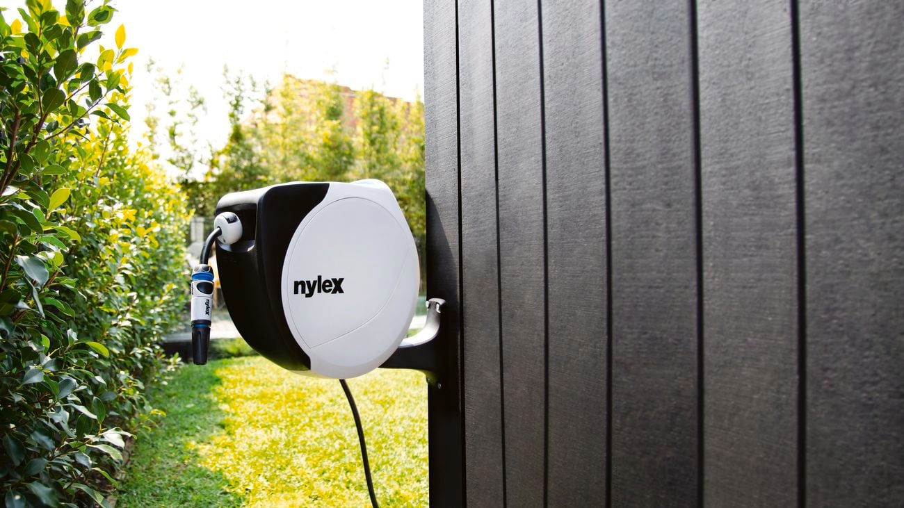 Nylex auto retractable hose reel mounted to an external wall