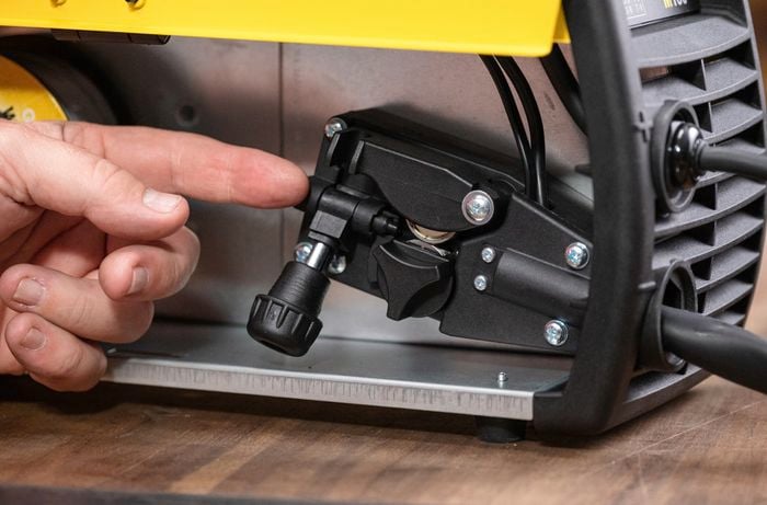 How to remove the drive roller cover from a mig welder