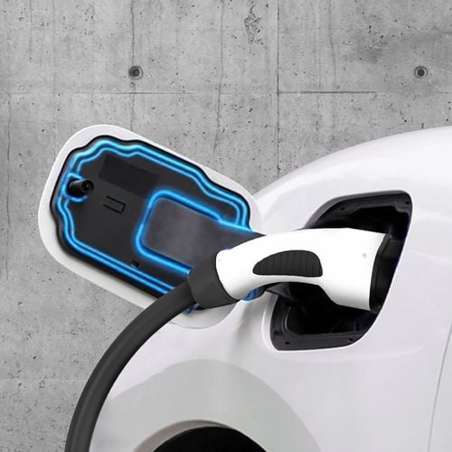 Close up of a car being charged.