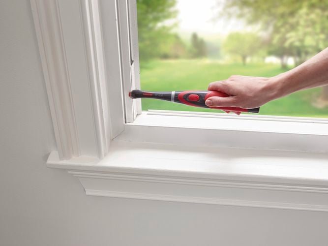 Power Scrubber cleaning windows.