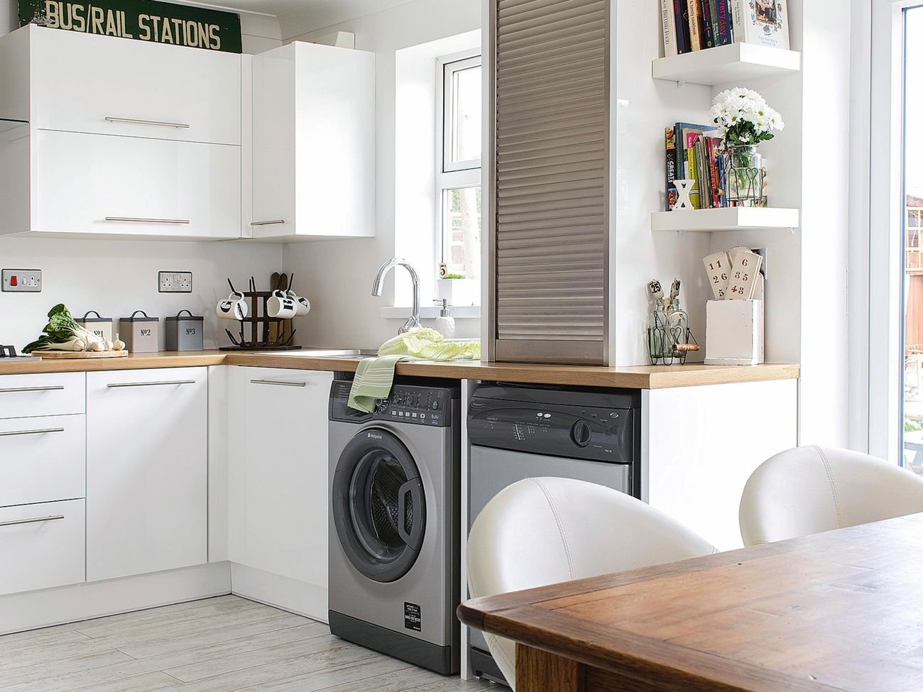 Laundry with washer, dryer and timber benchtop