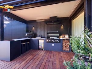 Outdoor area with a Barbecue and kitchen in it on decking.