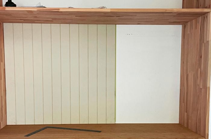 Panel header on ceiling with cordless drill driver