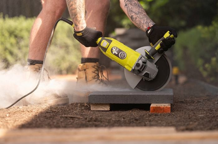 Cut a paver to create a balanced and symmetrical layout 