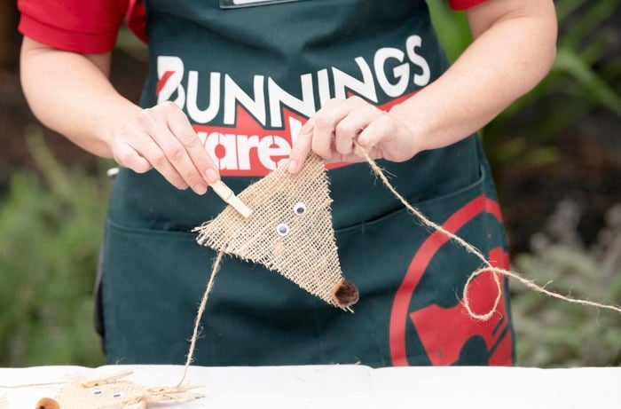 placing pegs on hessian reindeer flags