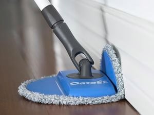 Close up of a Oates spin and clean compact mop.