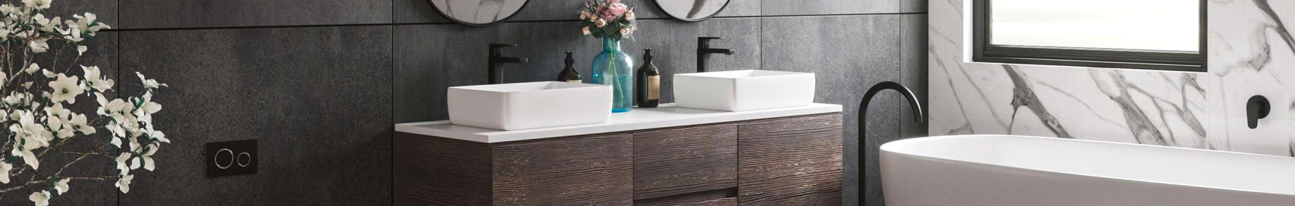 Brown bathroom with a bath and a sink